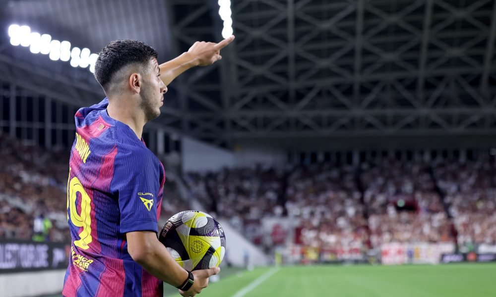 KOBE, JAPAN - JULY 27: FC Barcelona's Roony Bardghji prepares to take a corner kick during the preseason friendly between Vissel Kobe and FC Barcelona at Noevir Stadium Kobe on July 27, 2025 in Kobe, Hyogo, Japan. (Photo by Paul Miller/Getty Images)